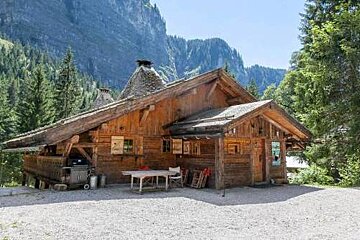 a chalet near some cliffs