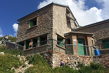 a stone refuge on a hillside