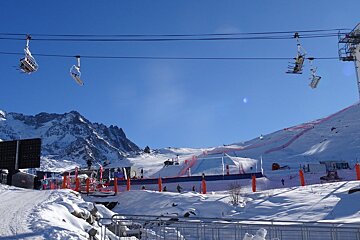 image of a chair lift on a mountain