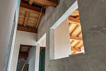 Looking up at the ceiling of a building under construction