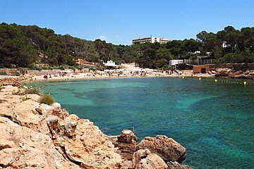 a view over some rocks of a beach in west ibiza