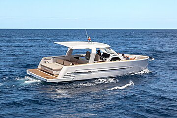 A white boat with the word vorsicht on the side