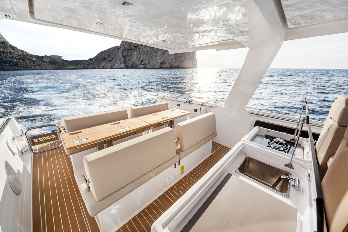 A boat with a sign that says ' aqua ' on it
