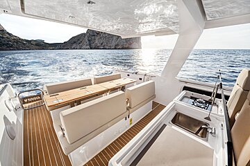 A boat with a sign that says ' aqua ' on it