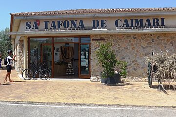 cyclists taking a break at a supermarket