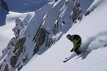 a man skiing a steep line on the valley Blanche