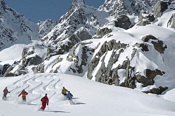 a group skiing off piste in Verbier