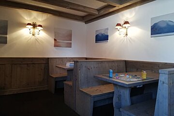 A table with a board game on it in a restaurant