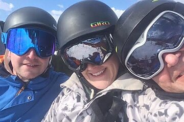 three people in helmets