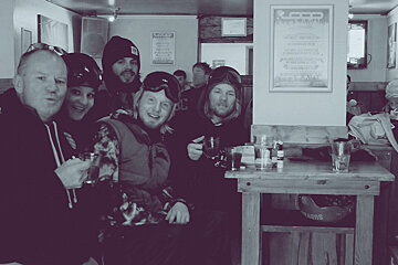 a group of people in a bar in tignes