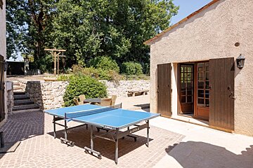 A ping pong table that says joola on it