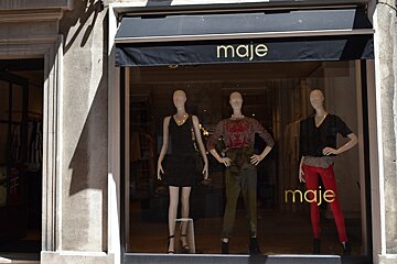 image of the Maje shopfront in Avignon with a black canopy and mannequin display in the window