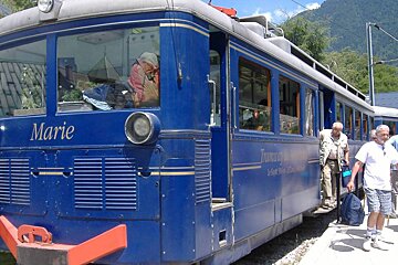 a blue tram train