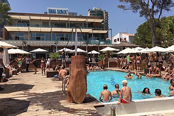 the exterior pool area of nikki beach mallorca