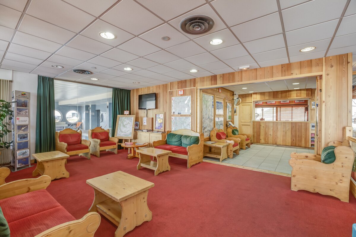 A room with wood paneling and a sign that says ' banquet ' on it