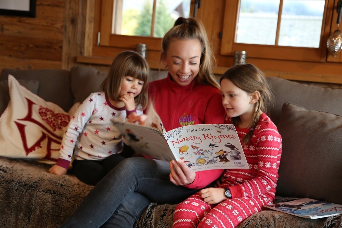 A young woman joyfully reads