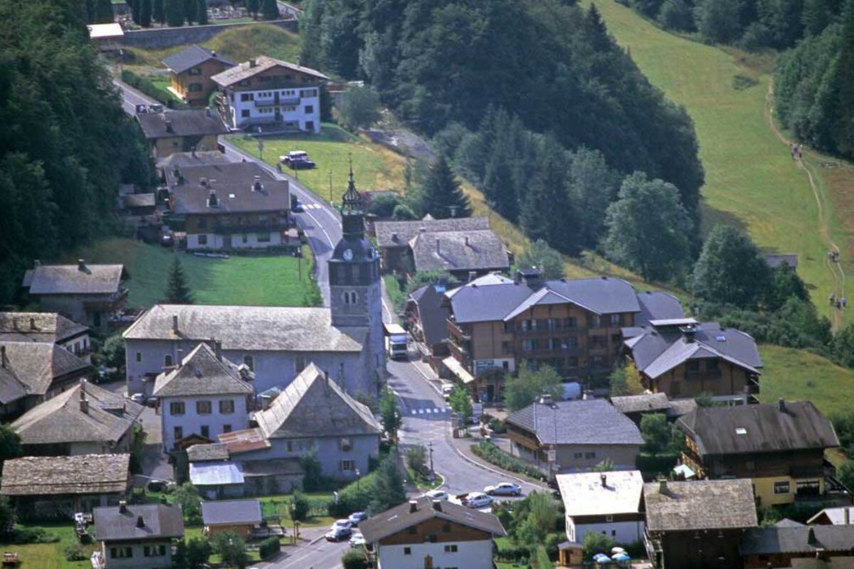An aerial view of a small village in the mountains