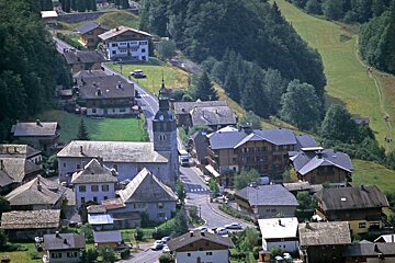 An aerial view of a small village in the mountains