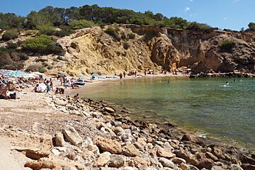 a view of a beach in south west ibiza - cala codolar