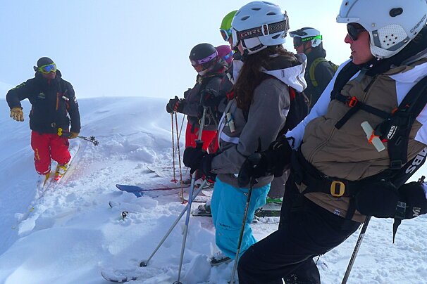 a ski instructor giving a group lesson