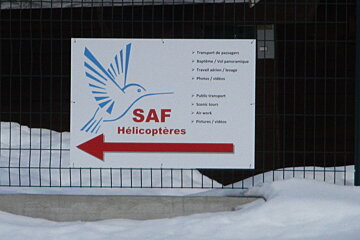 a sign for a heli transfer company