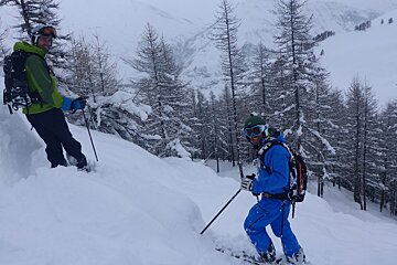 a skier with an instructor