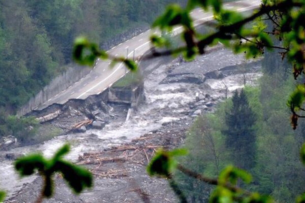 a road destroyed by floods at the weekend