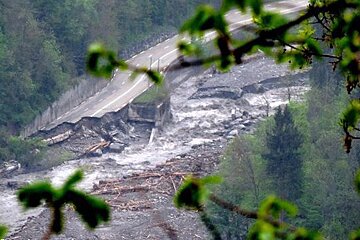 a road destroyed by floods at the weekend