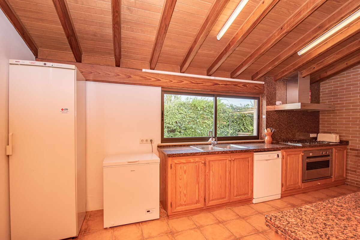 A kitchen with a lg refrigerator and a dishwasher