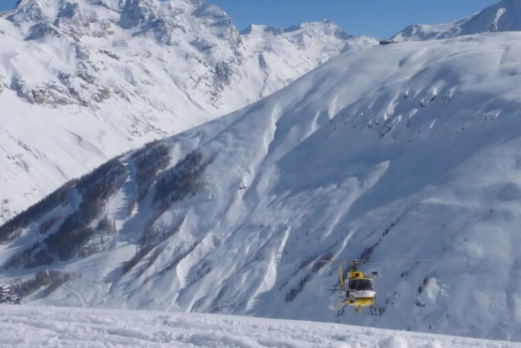 a helicopter landing for a rescue