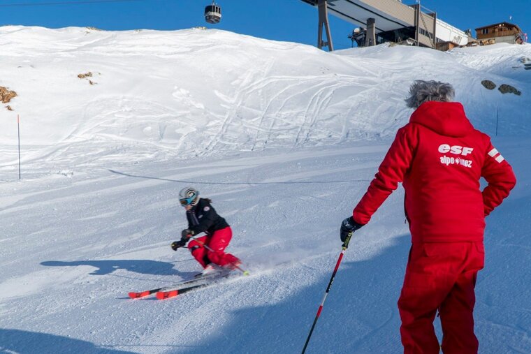 a ski instructor giving a private lesson