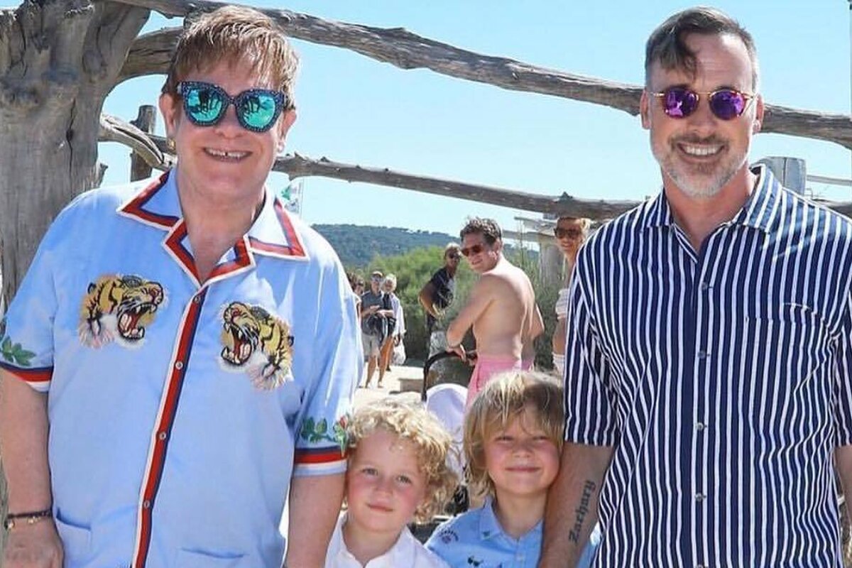 Elton John & family at Club 55 in Saint Tropez