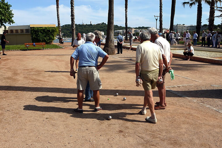 men playing a local french game in antibes