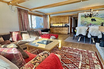 A living room with a couch and a coffee table