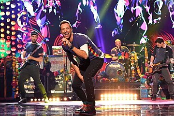 an image of the band coldplay onstage