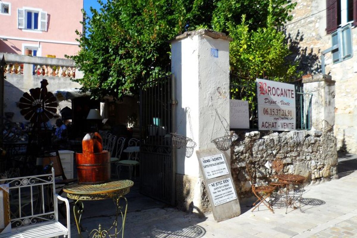 a street side shop selling antiques