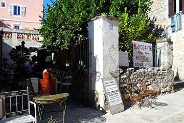 a street side shop selling antiques