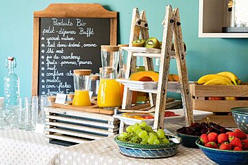 A buffet table with a sign that says produits bio