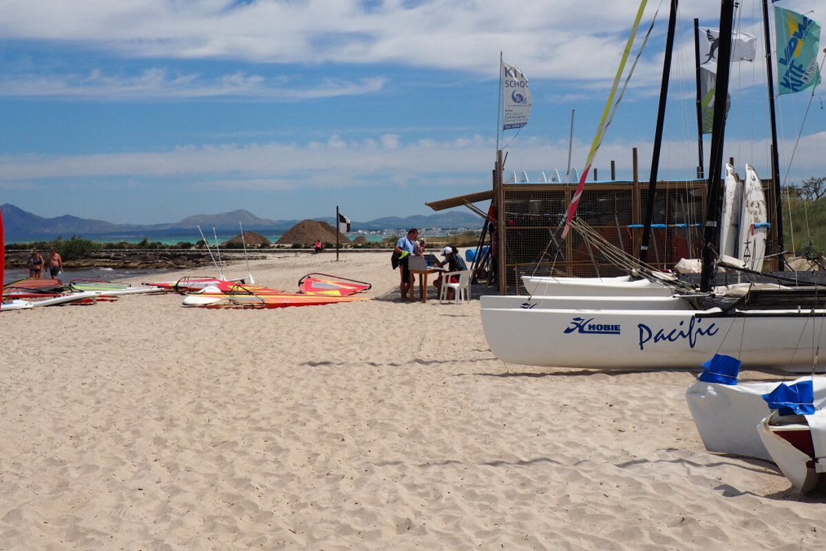 boats on the beach at a watersports centre