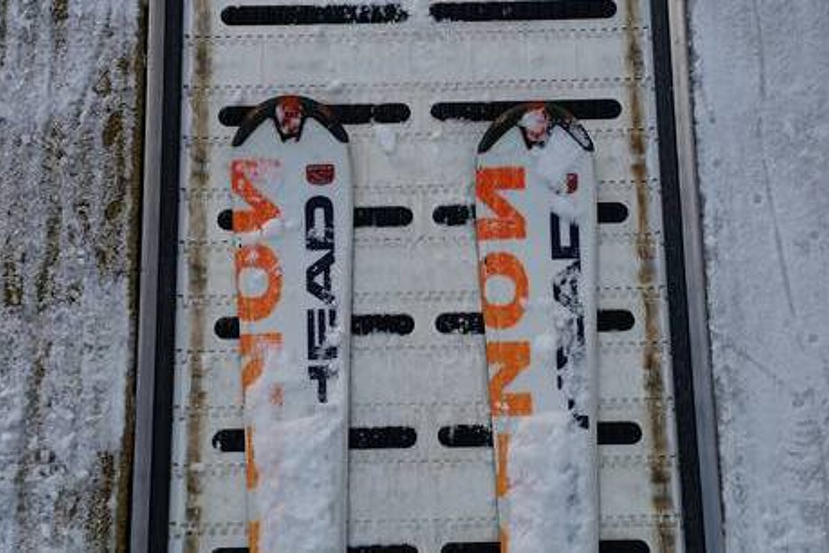 a pair of skis on a magic carpet