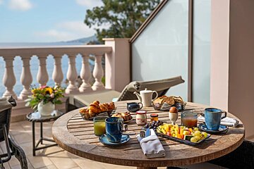 A table with a variety of food and drinks on it