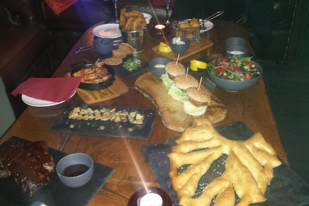 a table filled with different food dishes