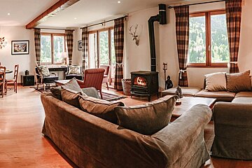 A living room filled with furniture and a fireplace