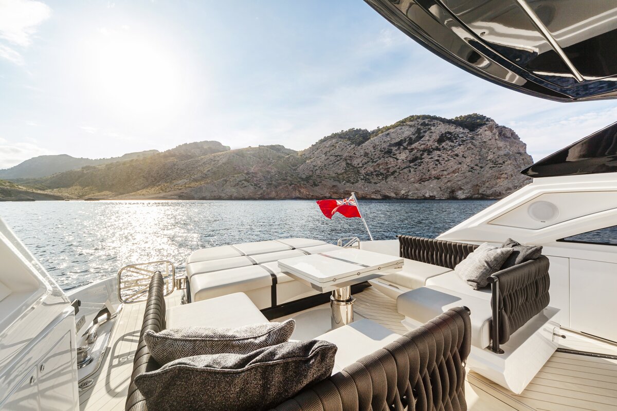 A boat with a table and chairs in the water