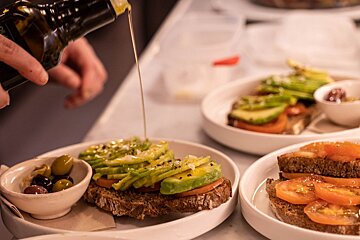 Preparing dishes at Cafe es pes de sa Palla
