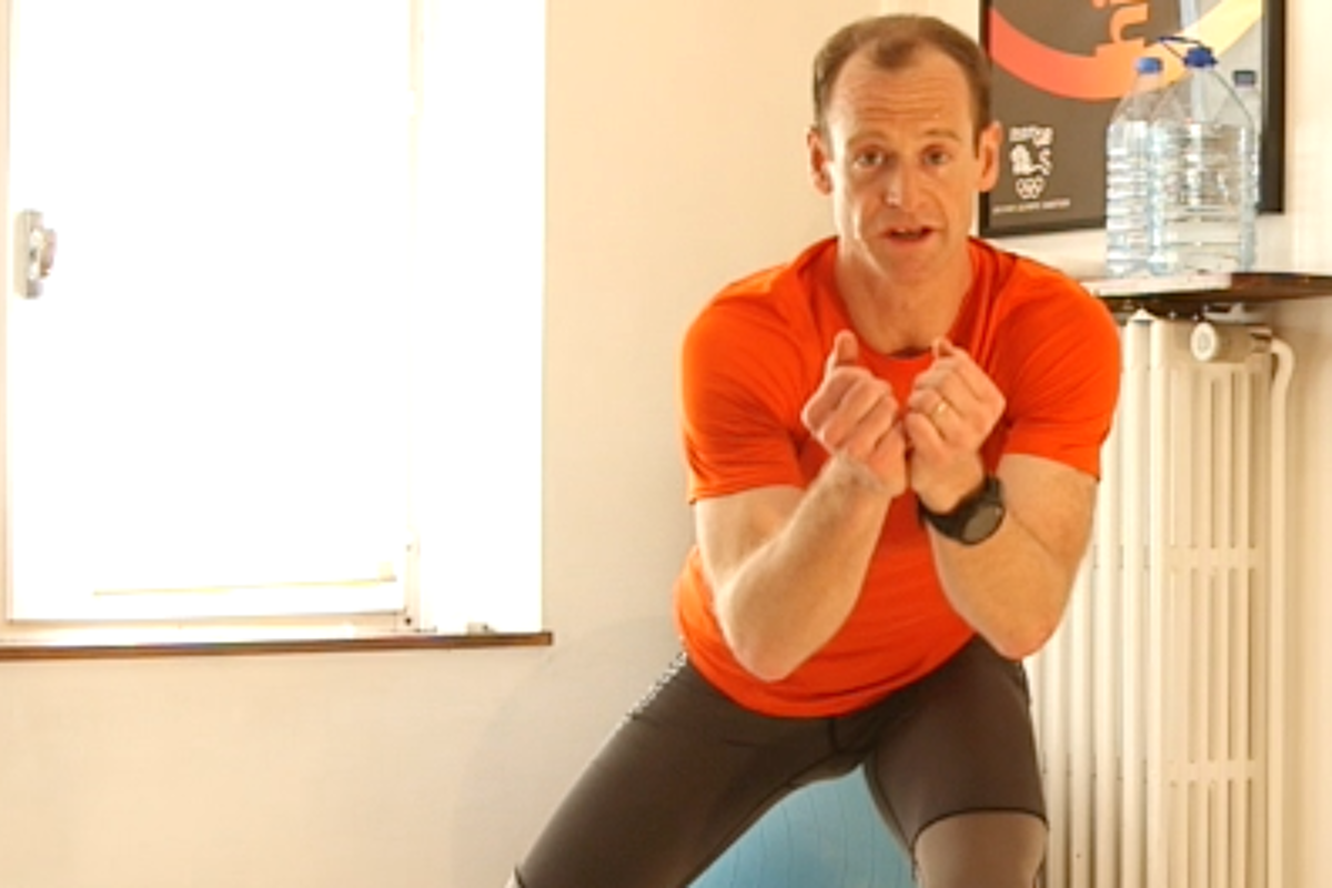 a fitness instructor demonstrating a workout