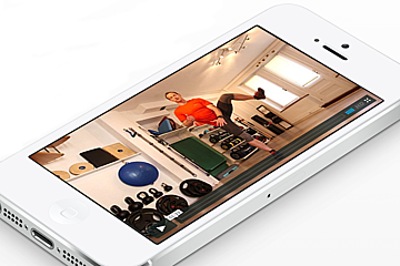 a tablet showing a fitness training programme