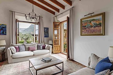 A living room with a couch and a coffee table