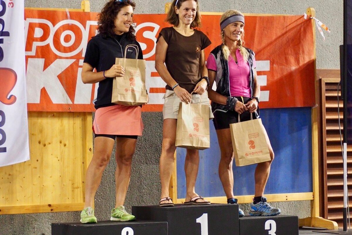 trail runners on a podium