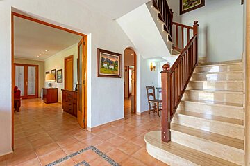 A staircase leading up to the second floor of a house